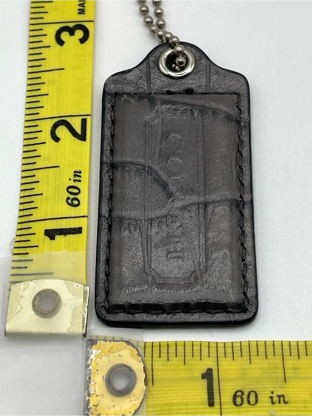 Coach Grey Crocodile Embossed Hang Tag